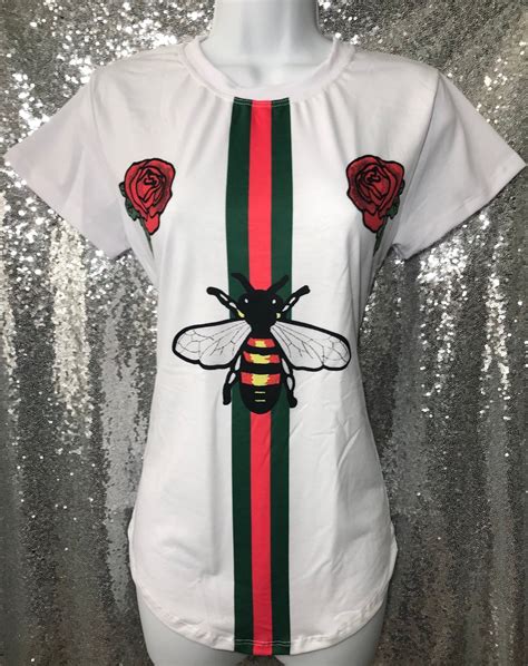 gucci bumblebee tshirt women|white gucci bag.